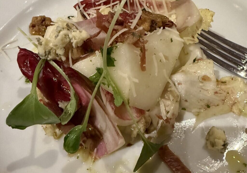 Prosciutto and pear salad with arugula